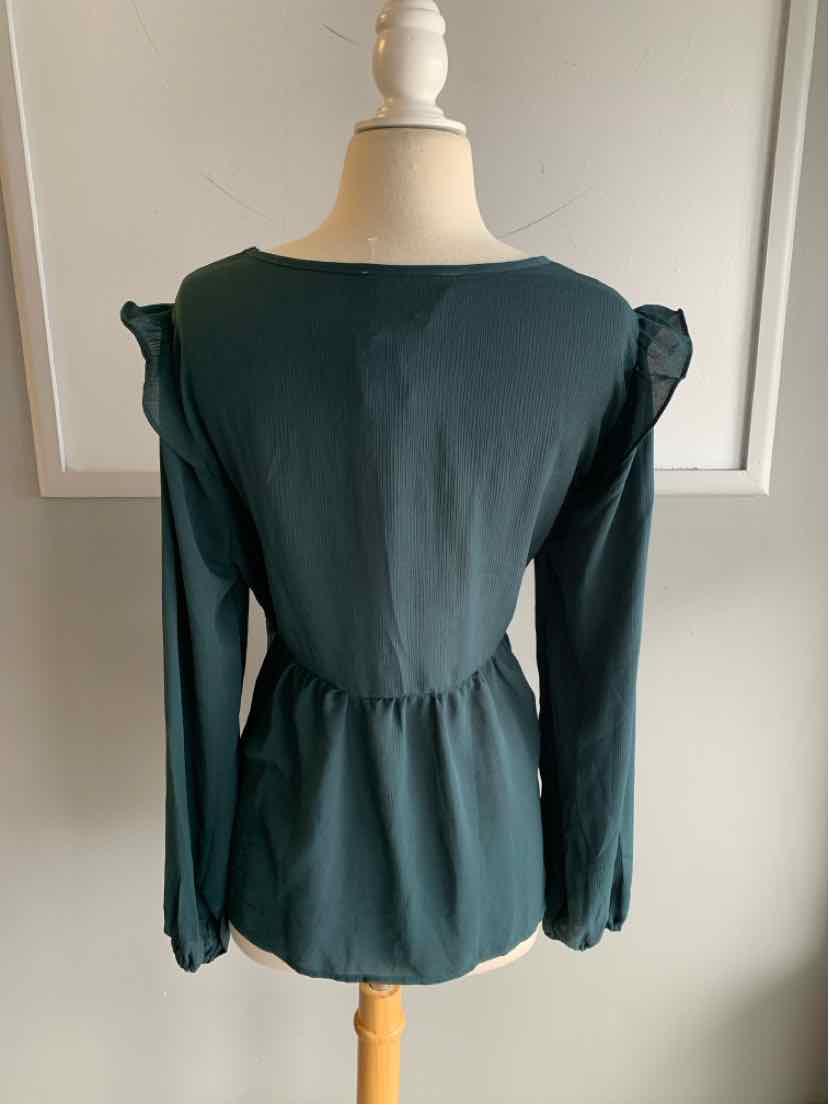 Teal long-sleeve blouse with ruffled shoulder details and cinched waist, size large.