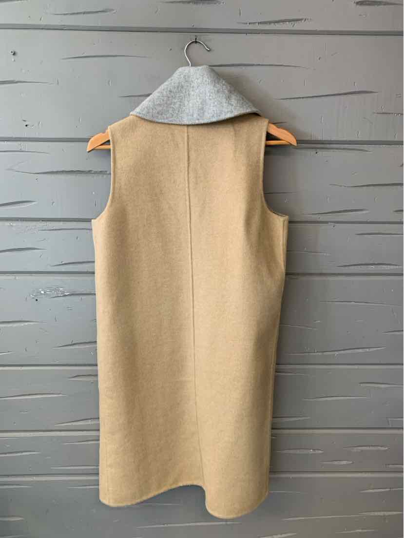 Sleeveless tan wool blend dress with a straight silhouette and back seam detail.