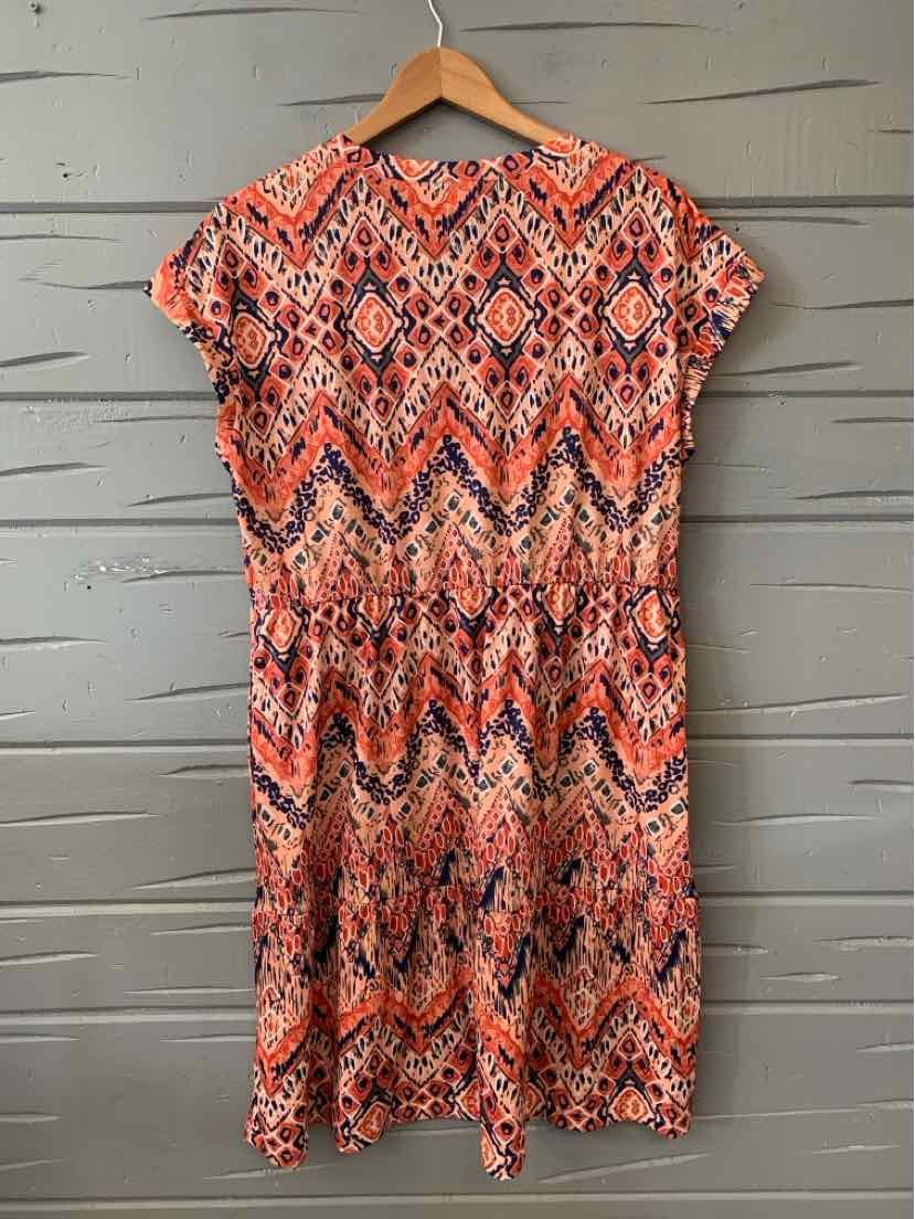 Orange and white geometric patterned short-sleeve dress with gathered waist, size XL.