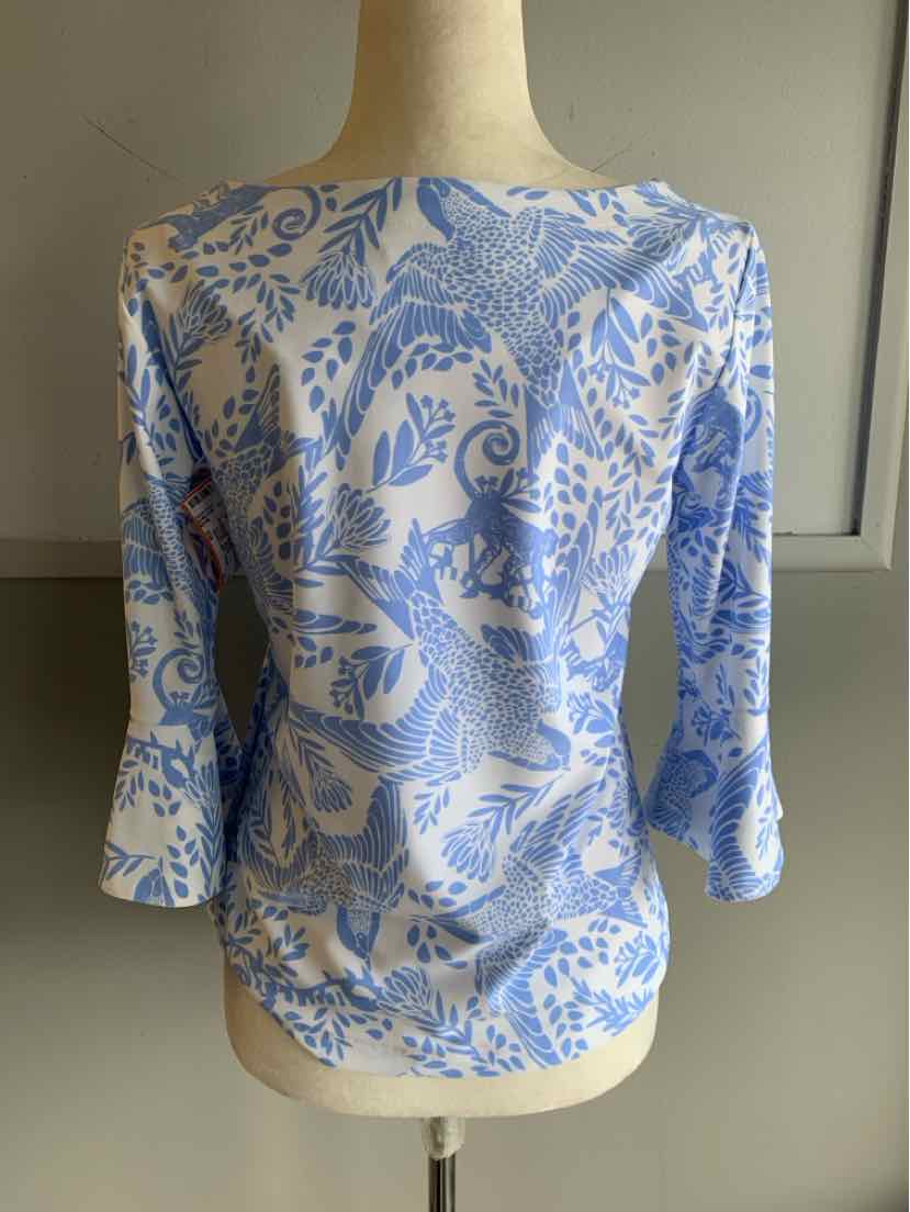 Light blue and white floral patterned blouse with three-quarter sleeves and a boat neckline.