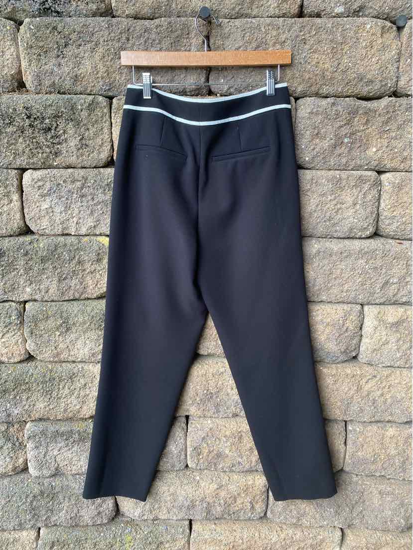 Black tailored pants with white trim on waistband and a single back pocket, size 4.