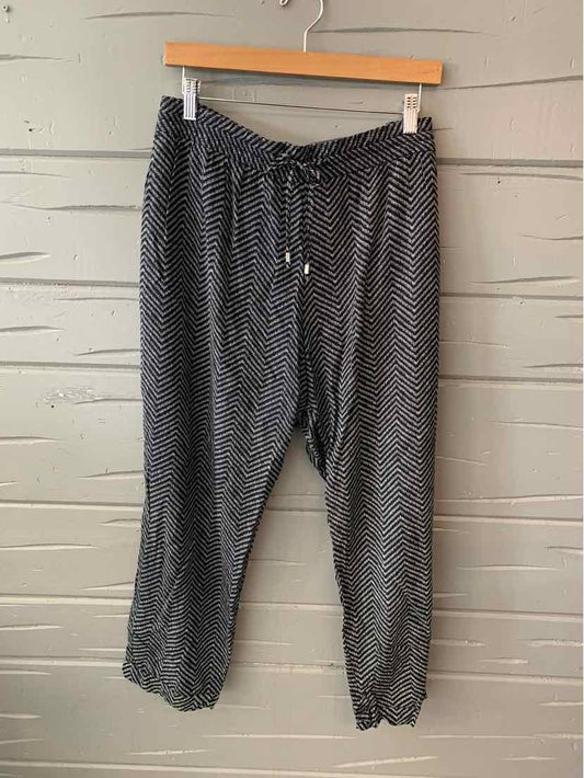 Black Old Navy women's XL jogger pants with white dotted pattern and elastic waistband with drawstring.