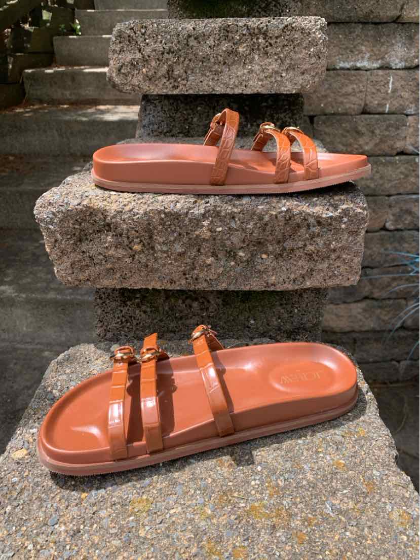 Brown leather double-strap slide sandal with flat sole, size 7.5, casual style.
