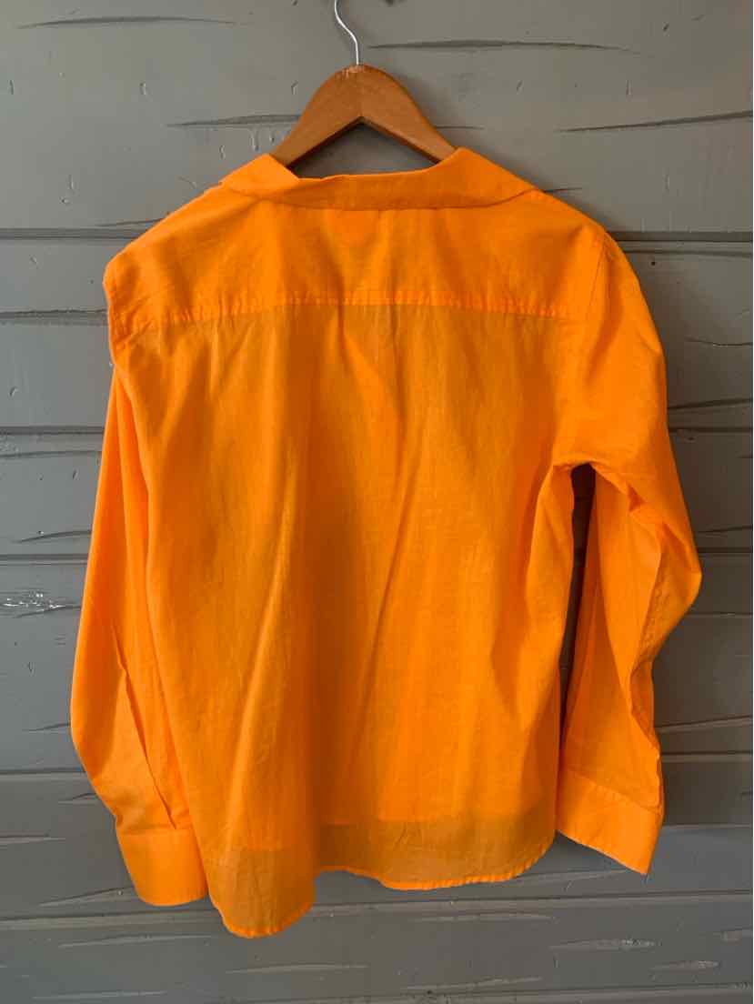 Bright orange long-sleeve blouse with a loose fit and buttoned cuffs on a wooden hanger.