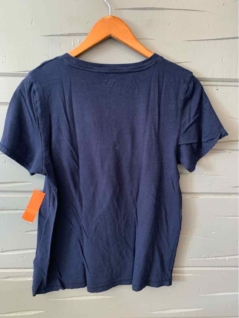 Navy blue short-sleeve cotton t-shirt with crew neck, displayed on wooden hanger against white panel backdrop.
