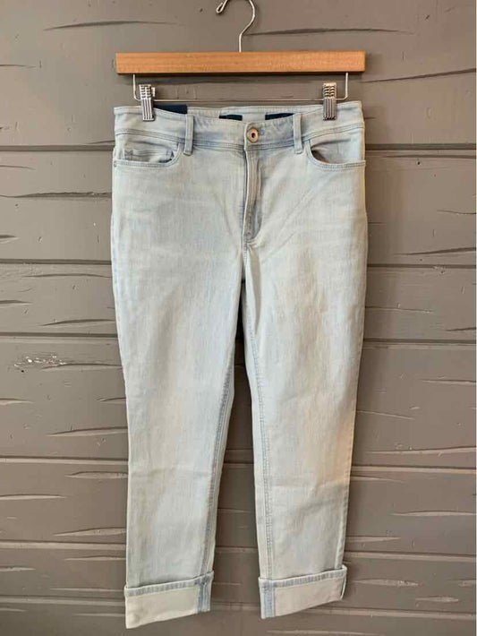 Light wash denim jeans with cuffed hems and classic five-pocket styling, size 4.