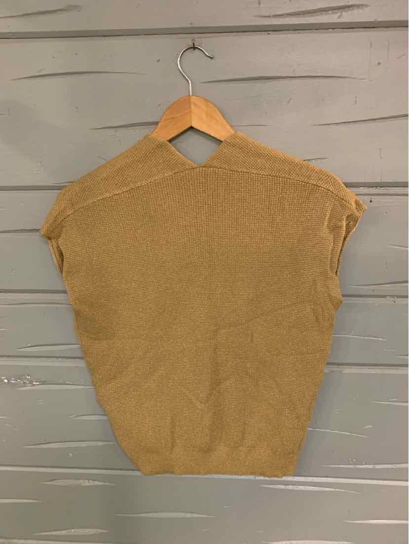 Gold metallic short-sleeve knit top with ribbed hem on wooden hanger.