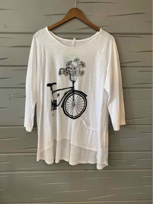 White long-sleeve women's tunic with black bicycle and flower graphic on front.