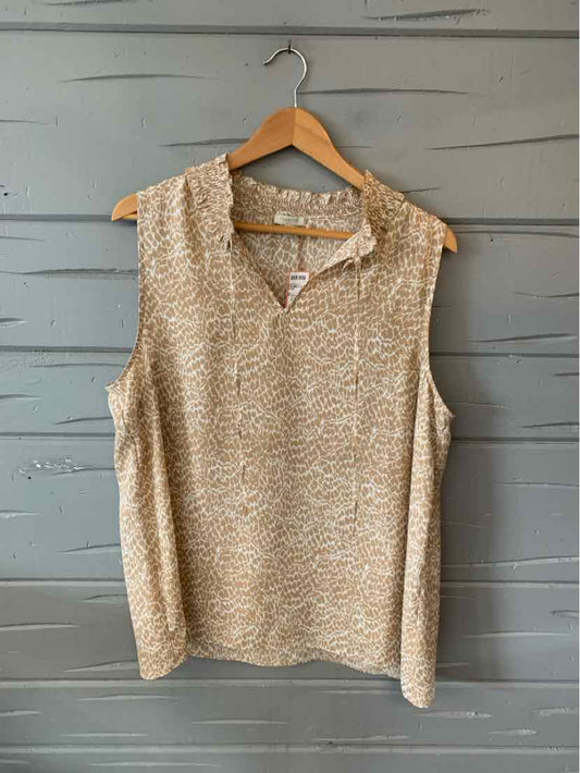 Tan sleeveless knit top with subtle cheetah pattern, collar, and XL size tag on wooden hanger.