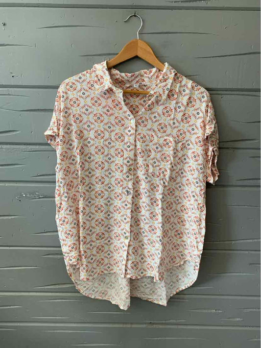 XL women's short-sleeve blouse with pastel floral print and button-up front.