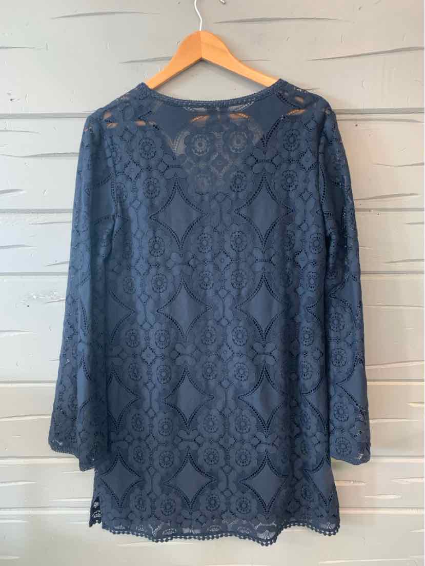 Navy blue lace long-sleeve blouse with floral and geometric patterns, scalloped hem and cuffs.