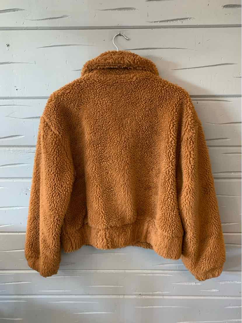 Tan sherpa fleece jacket with a plush texture and relaxed fit, size large.