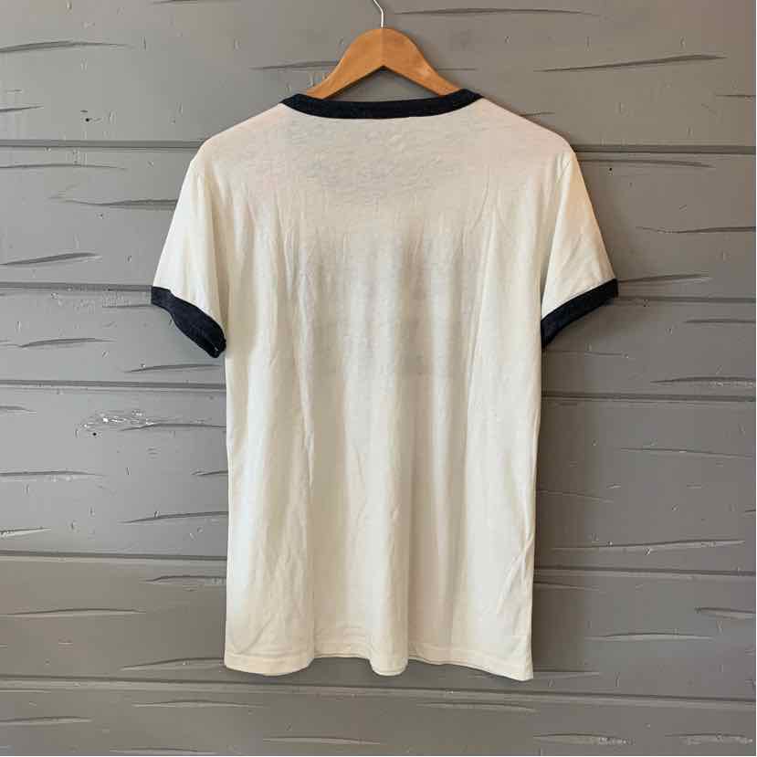 White short-sleeve t-shirt with black collar and sleeve cuffs, medium size, slim fit.