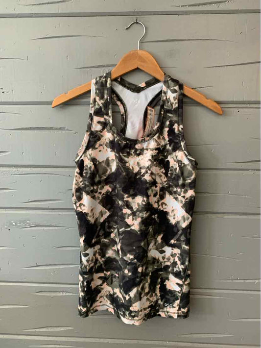 Black, gray, and white camo-patterned sleeveless athletic tank top with racerback on wooden hanger.