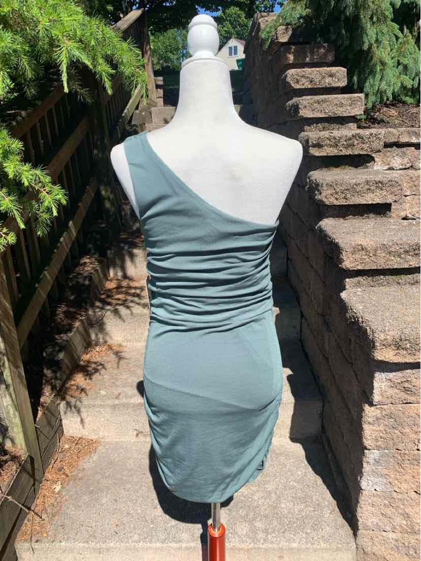 One-shoulder, fitted midi dress in muted green with ruched sides and smooth fabric finish.