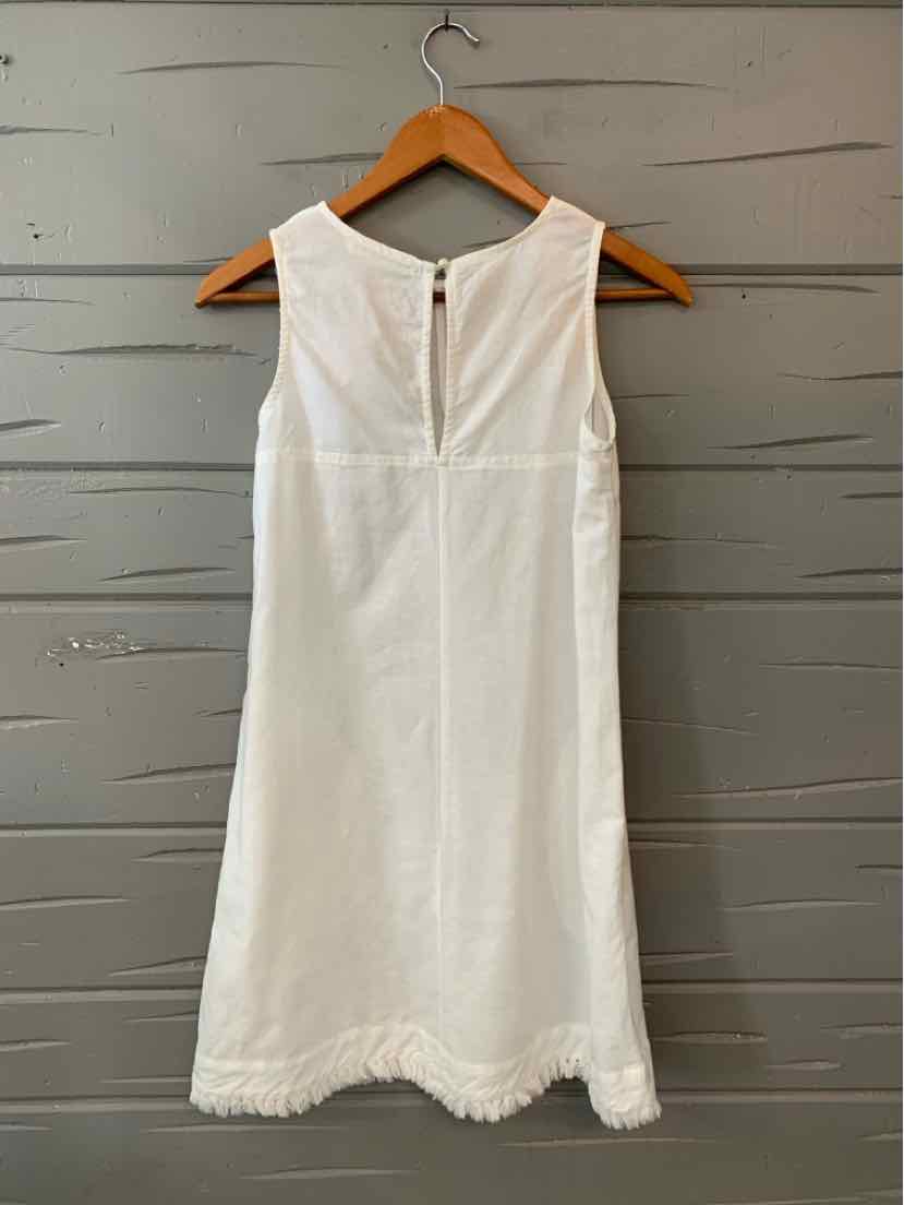 White sleeveless linen dress with back zipper and scalloped hem, size 8.