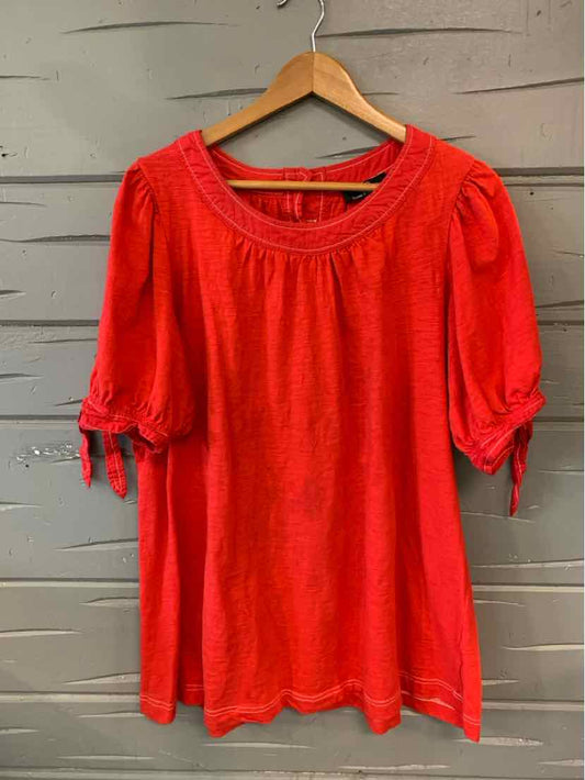 Red Suzanne Betro women's top with puff sleeves and gathered cuffs, size XL.