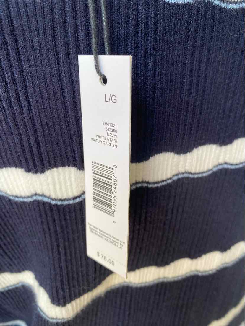 Navy blue ribbed knit fabric with white horizontal stripes and white size tag labeled LG hanging on black string.