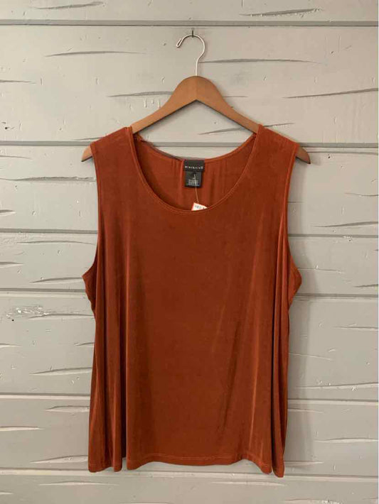 Rust-colored sleeveless knit tank top with scoop neckline and relaxed fit on wooden hanger.