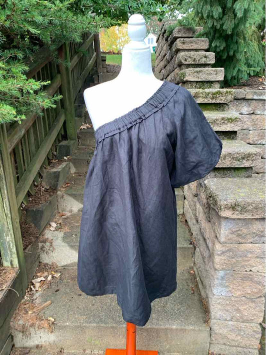 Women’s dark charcoal Anthropologie dress with a one-shoulder neckline and loose, gathered silhouette.