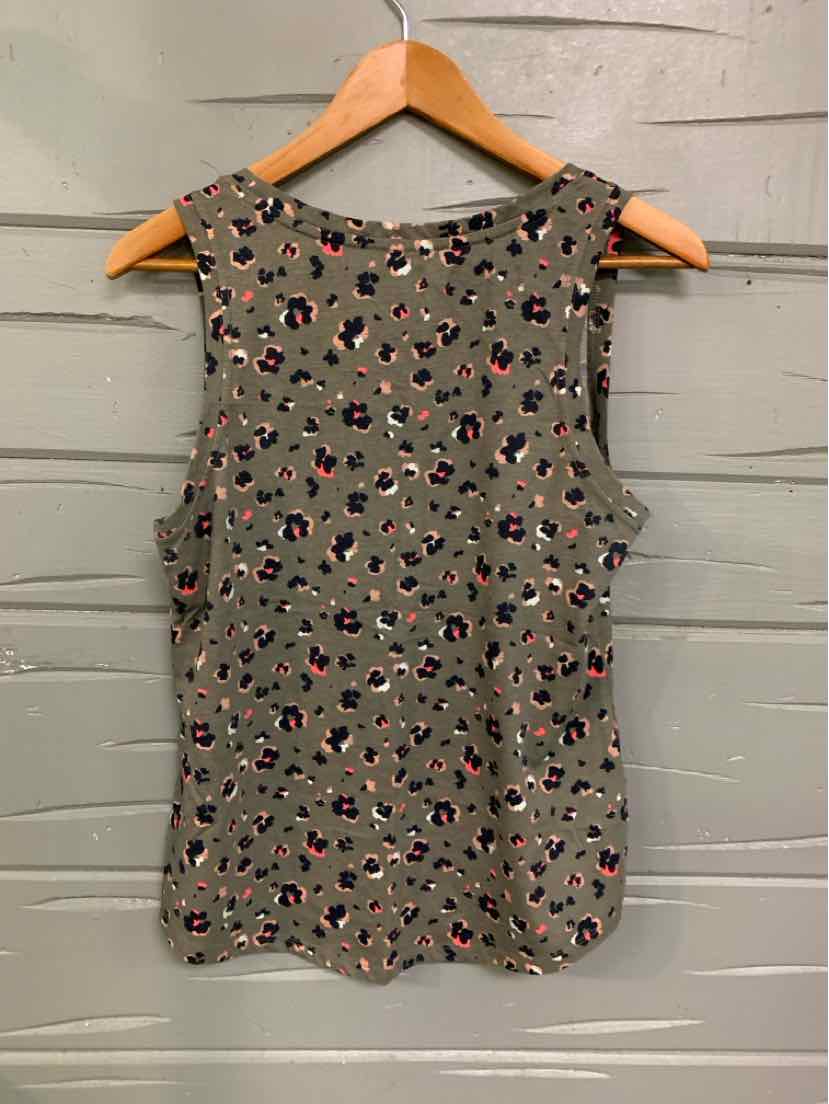 Olive green sleeveless top with multicolor floral pattern and round neckline.