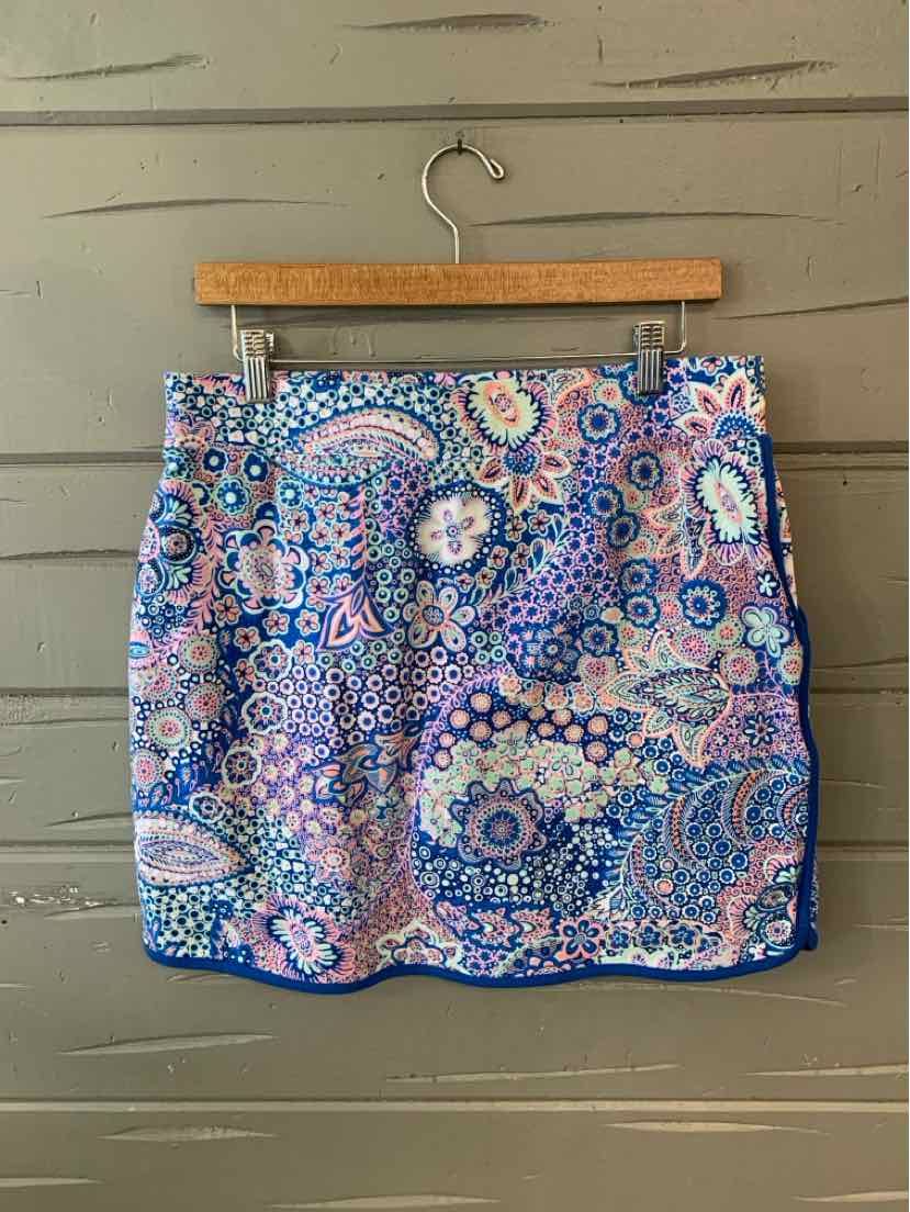 Blue and pink floral paisley patterned skirt with a straight hem and side slit.