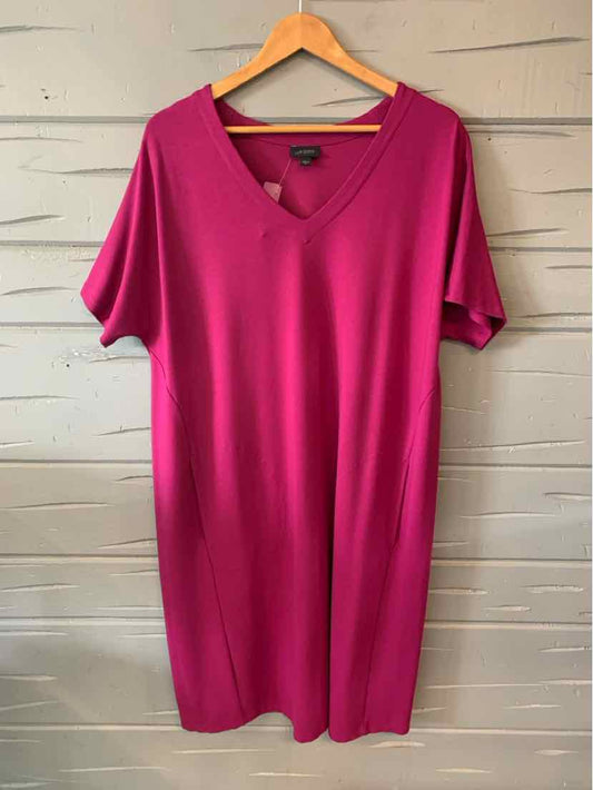 Bright pink knee-length dress with V-neck and short sleeves on wooden hanger.