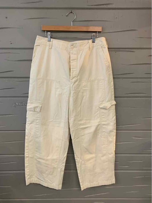Beige wide-leg cargo pants with button fly and side flap pockets, size 12.