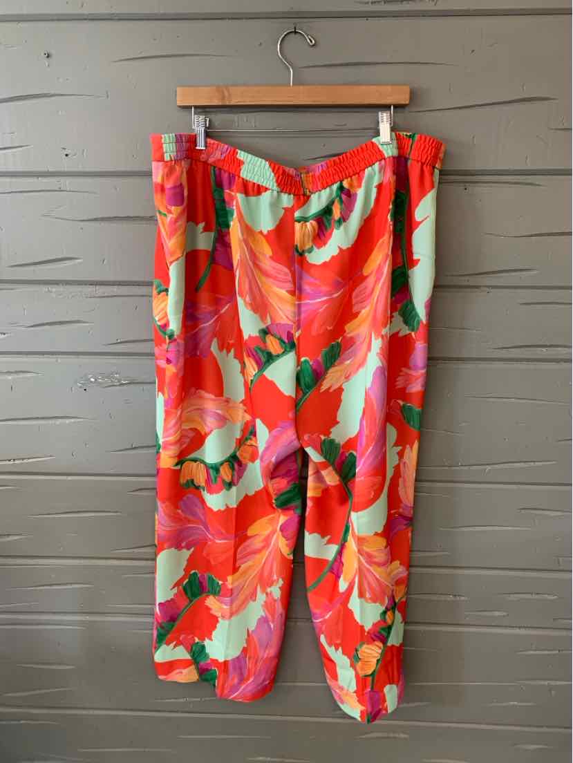 Colorful floral print pants in red, pink, green, and orange with a relaxed fit, size 18.