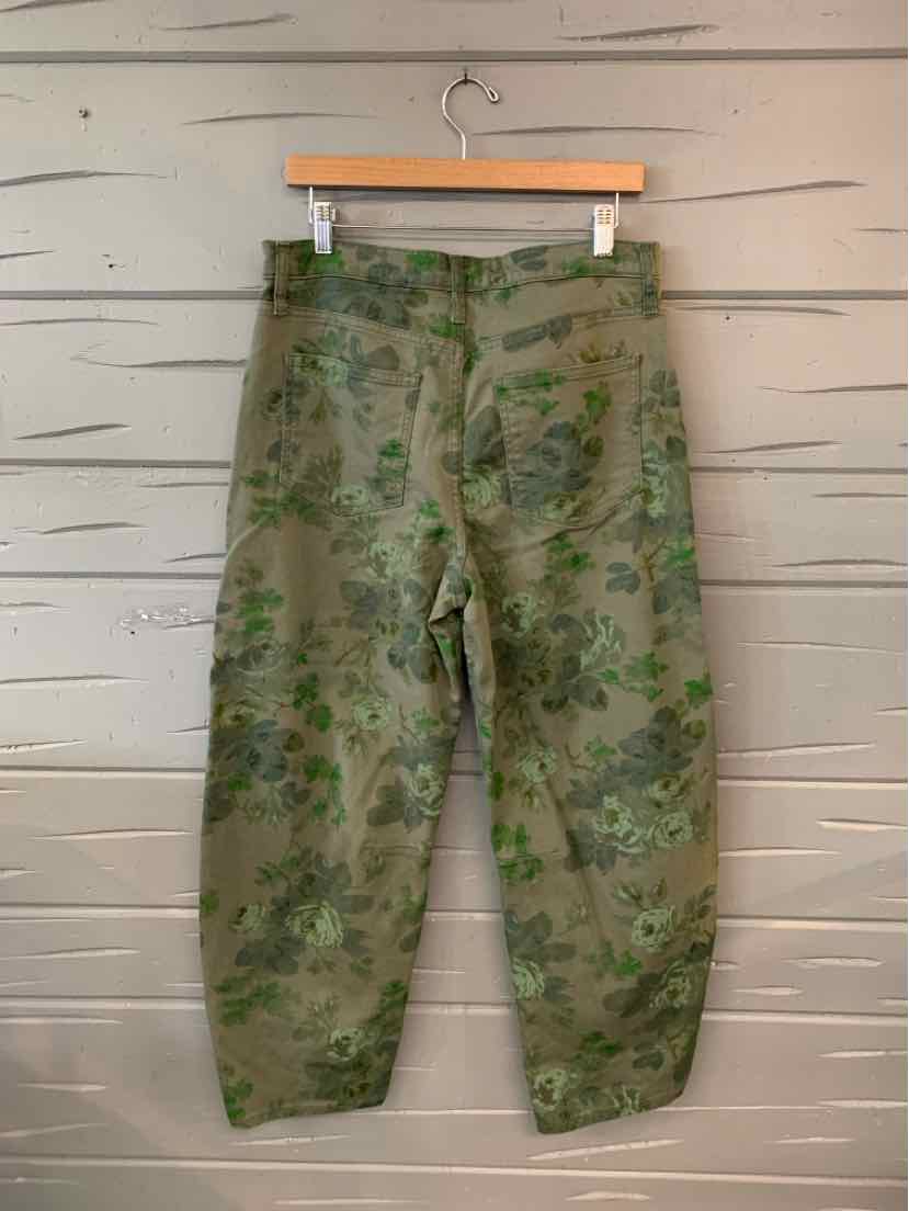 Olive green cargo pants with a faded floral print and elastic cuffs.