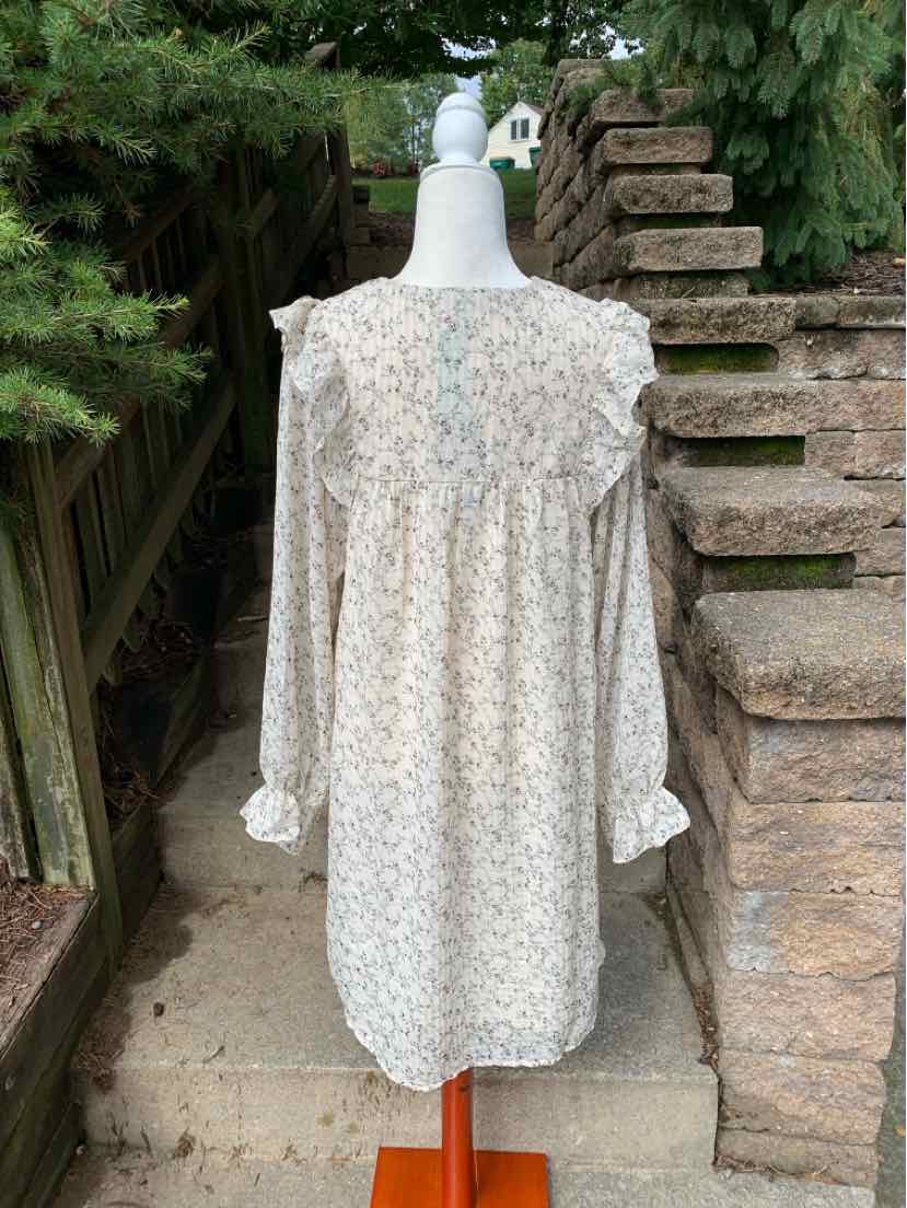 Oatmeal-colored floral dress with long puff sleeves, ruffle collar, and gathered waist in size XL.