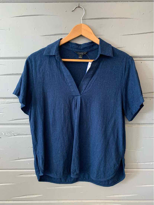 Navy blue short-sleeve polo shirt with collar and V-neck, lightweight fabric.