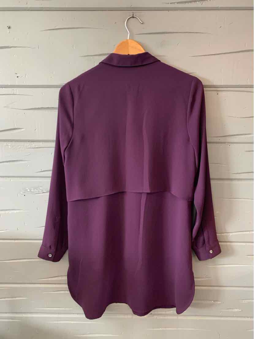 Deep plum long-sleeve blouse with layered back detail and buttoned cuffs, size XS.