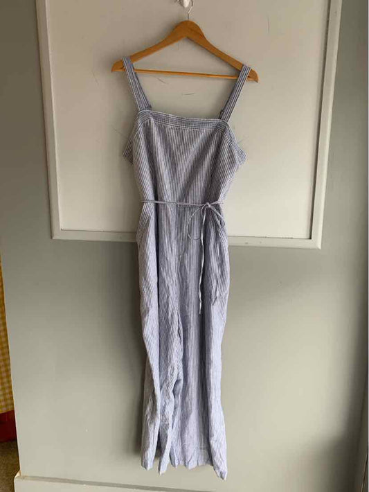 Light blue and white striped sleeveless jumpsuit with adjustable straps and waist tie, size XL.