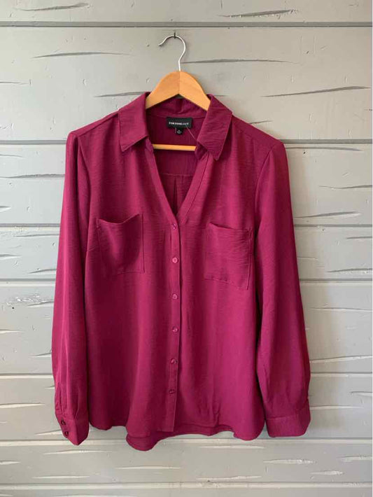 Long-sleeve burgundy blouse with chest pockets and button-down front, size XL.