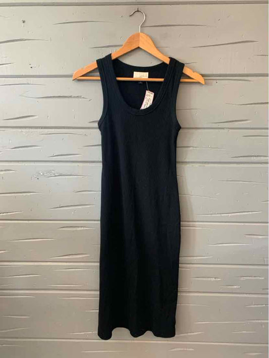 Black sleeveless ribbed knit dress with a fitted silhouette and scoop neckline in XS size.