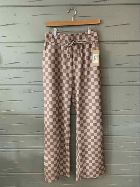 High-waist wide-leg pants with brown and beige checkered pattern and adjustable waist tie.