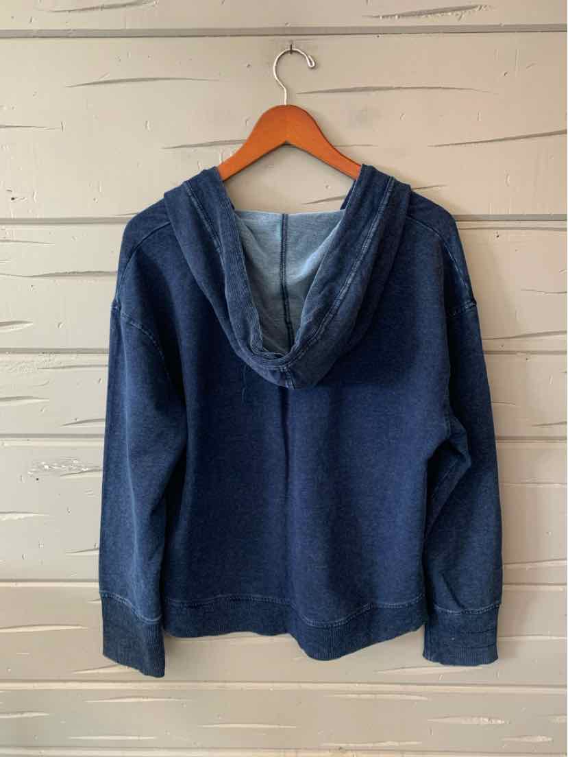 Women’s solid navy blue long-sleeve top with a draped V-neck hood and soft knit fabric.