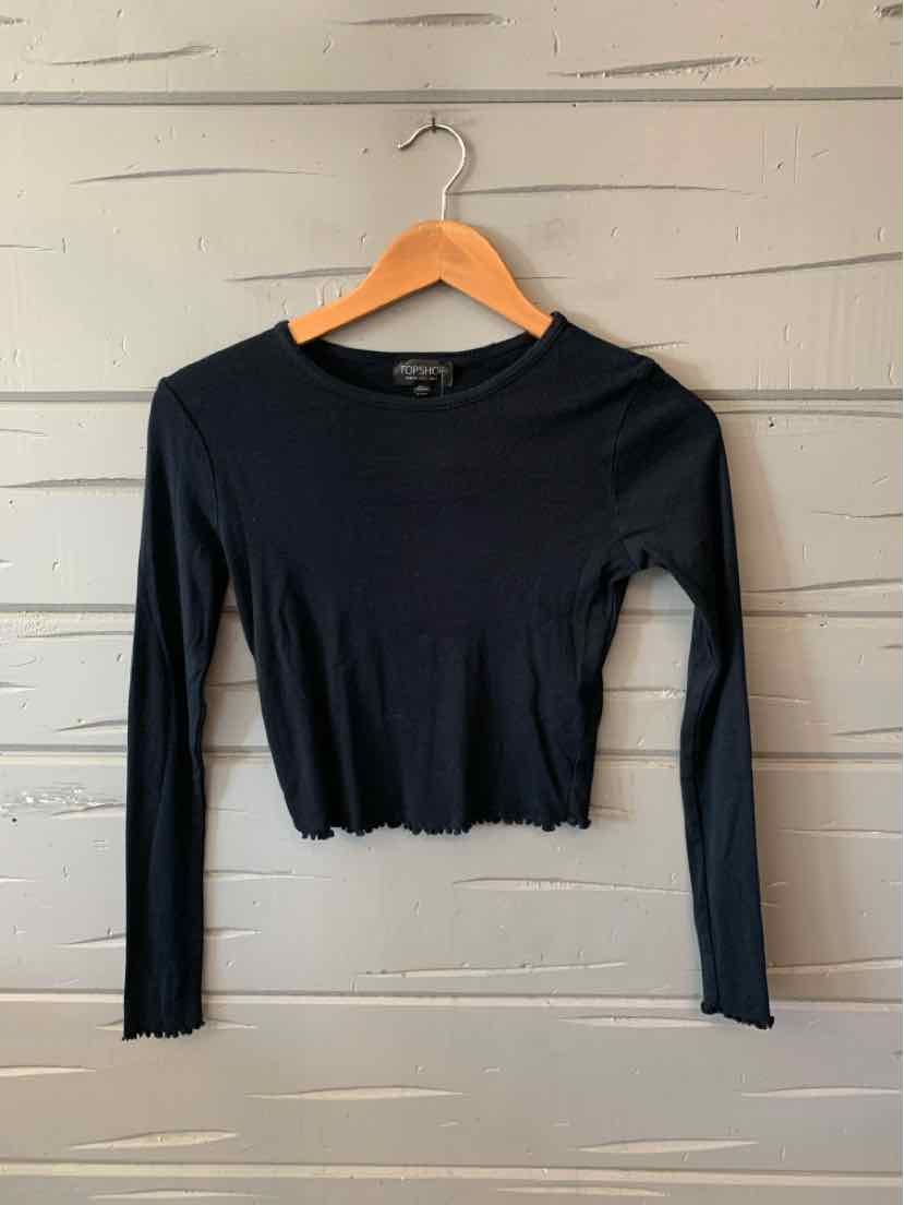 Black long-sleeve crop top with a round neckline and scalloped hem, size 2.