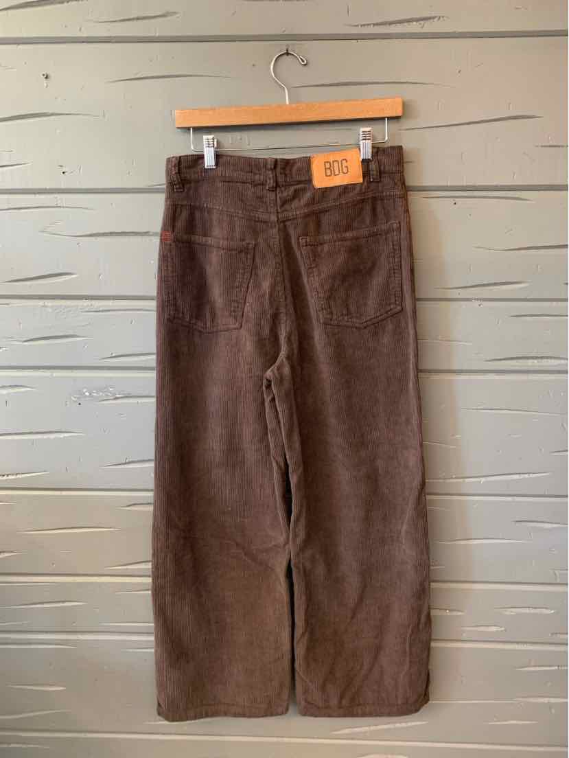 Brown wide-leg corduroy pants with front pockets, belt loops, and a button closure.