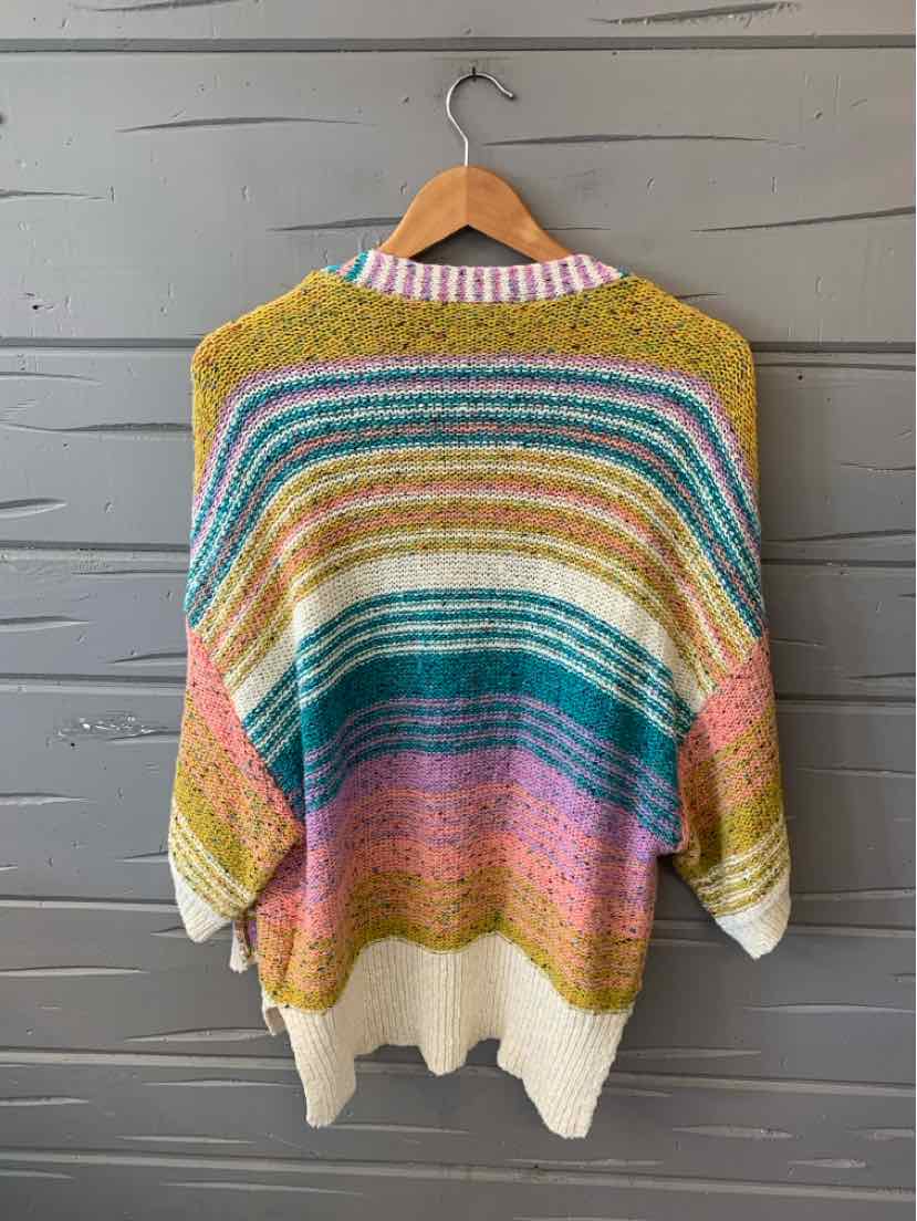 Multicolor knit sweater with horizontal tribal-inspired stripes in mustard, teal, pink, and cream, medium size.