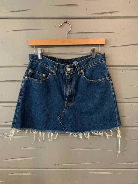 Dark blue denim mini skirt with frayed hem and front pockets, size M/L.