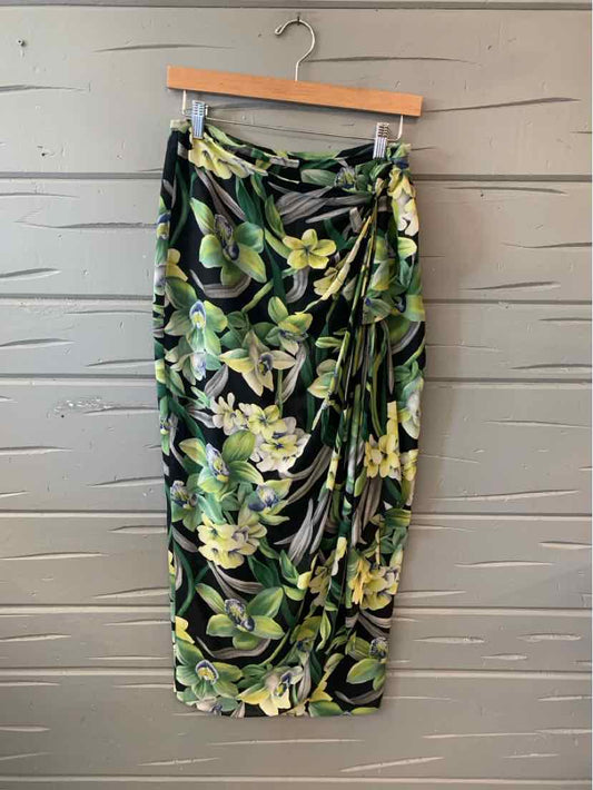 Dark green floral pencil skirt with ruched side detail and knee-length cut.