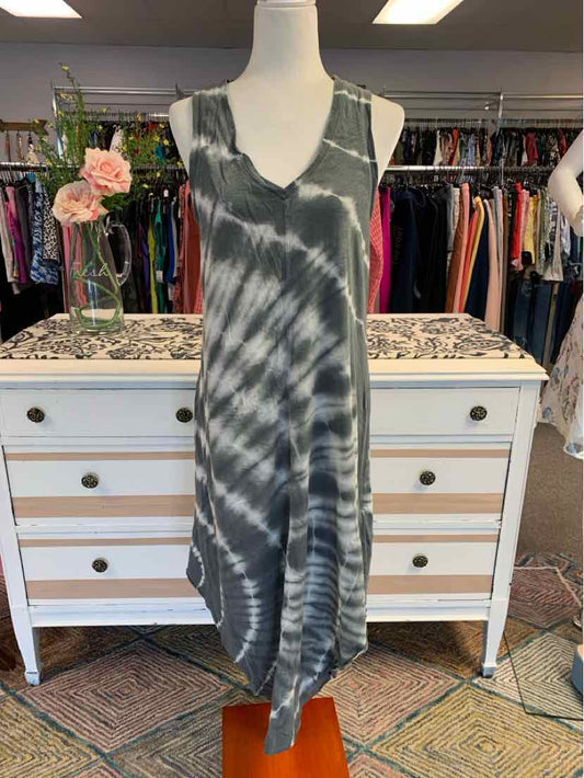 Gray and black tie-dyed sleeveless midi dress with a relaxed fit on mannequin.