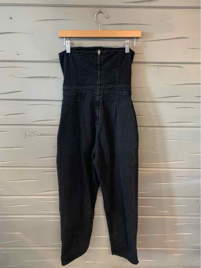 High-waist black denim jumpsuit with a front zipper and fitted silhouette in size small.