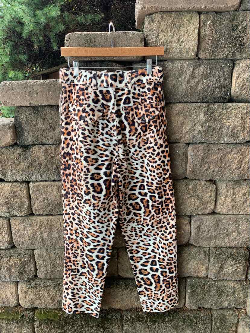 Tan and black cheetah print casual pants with adjustable white drawstring waistband.