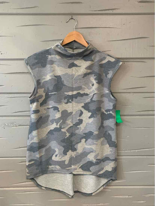 Gray camo sleeveless hoodie with high neckline and curved hem on wooden hanger.