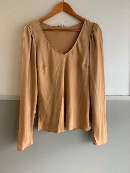 Tan long-sleeve blouse with scoop neckline and slight puff shoulder detail, size large.
