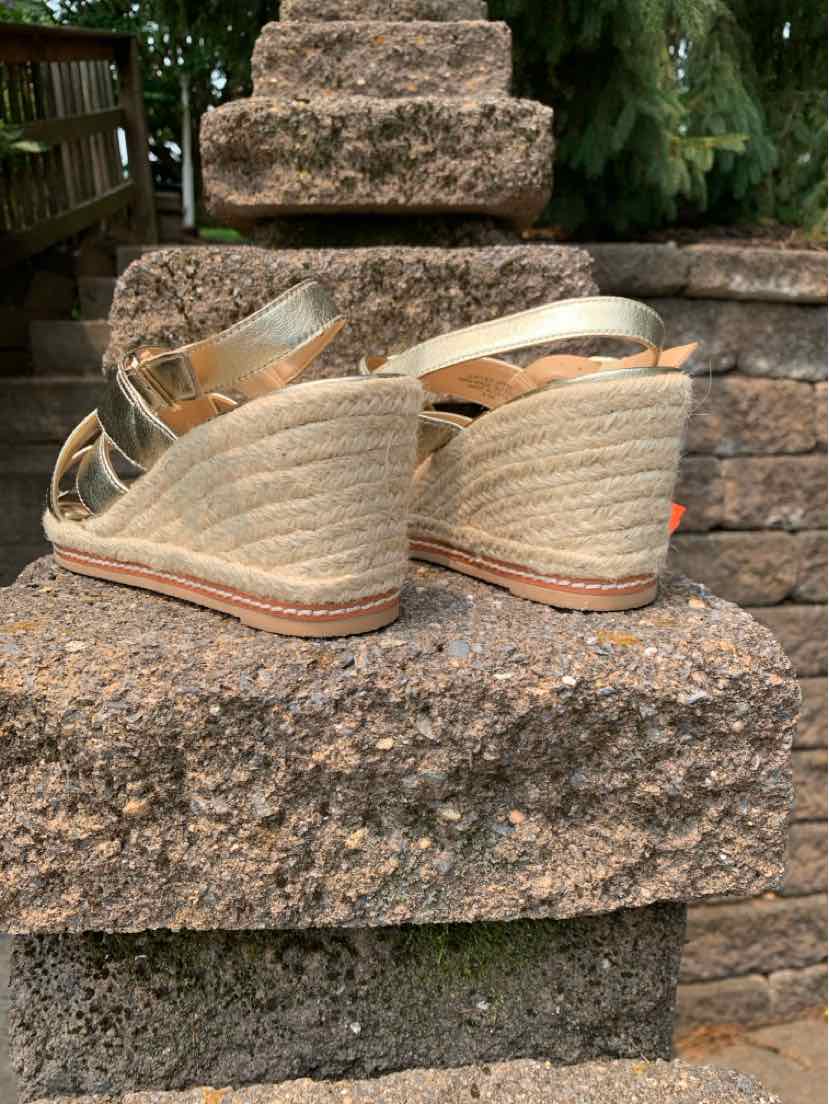 Wedge sandals with metallic gold straps and braided jute espadrille heels, size 8.5.