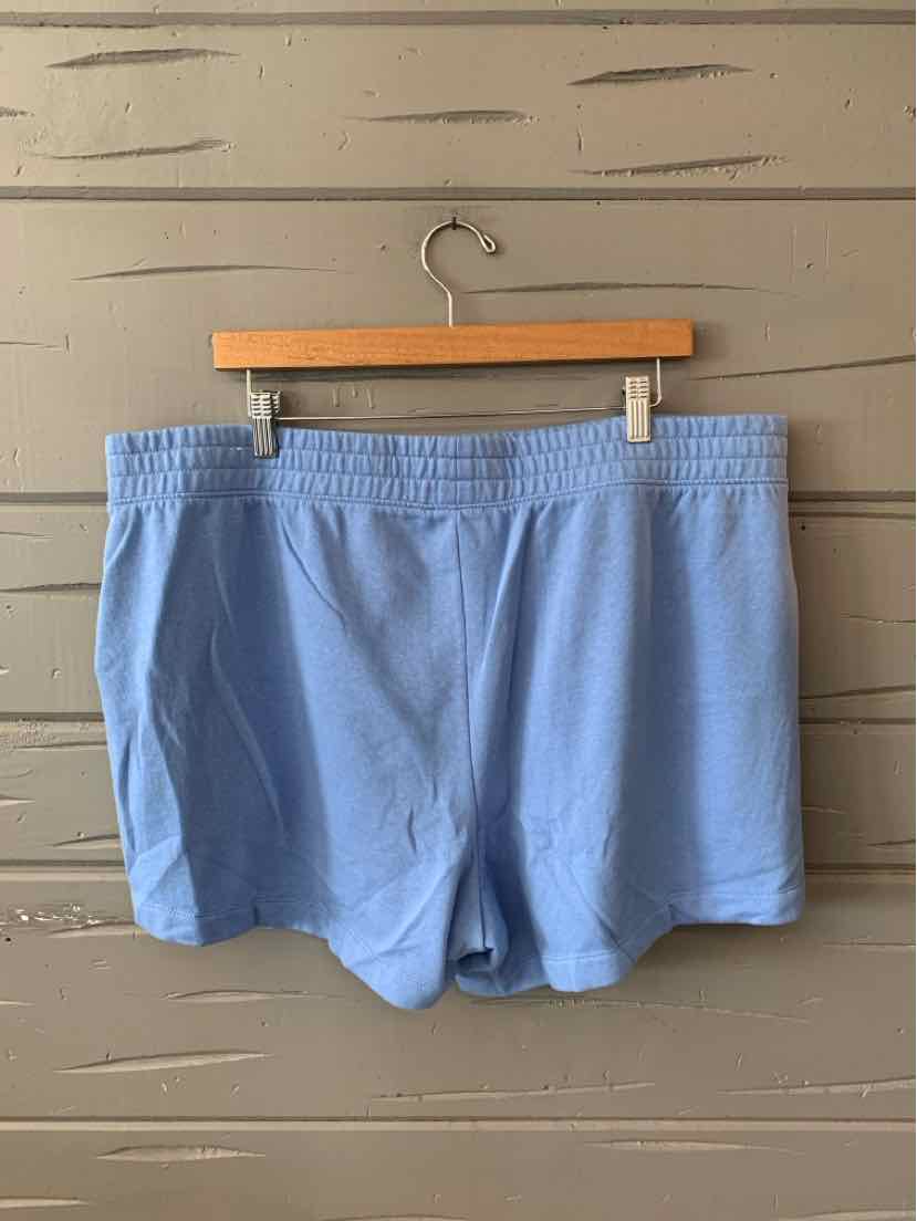 Light blue elastic waistband shorts with a relaxed fit and soft fabric.